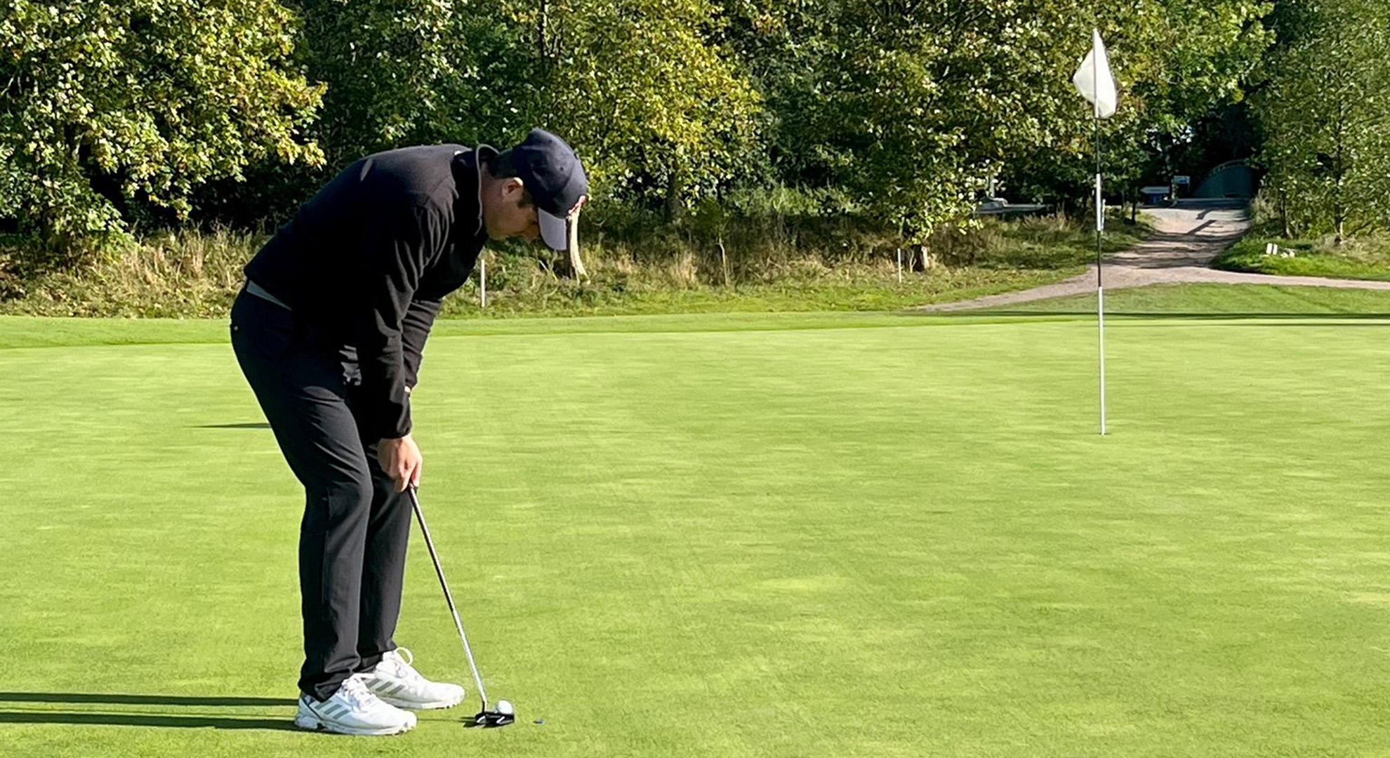 Golfspieler auf Grün